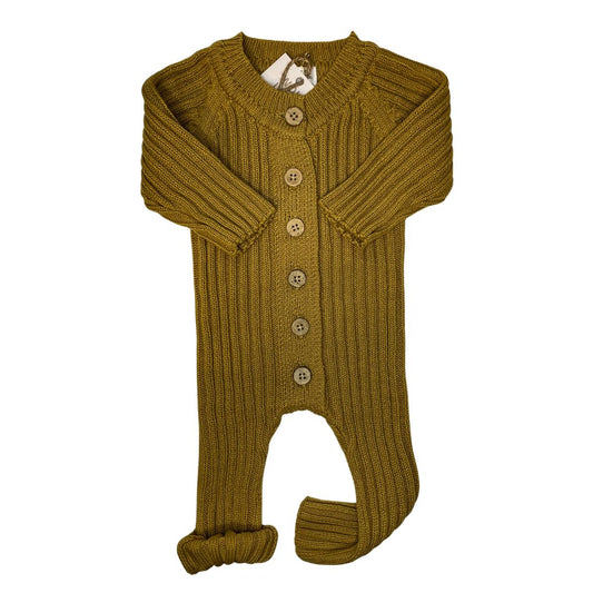 Authentic Little B's Nursery knit romper in the color Mustard. Featuring wood like buttons up the from and rollable arms and legs for extended wear.