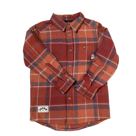 Flat lay of the front of the flannel shirt in autumn