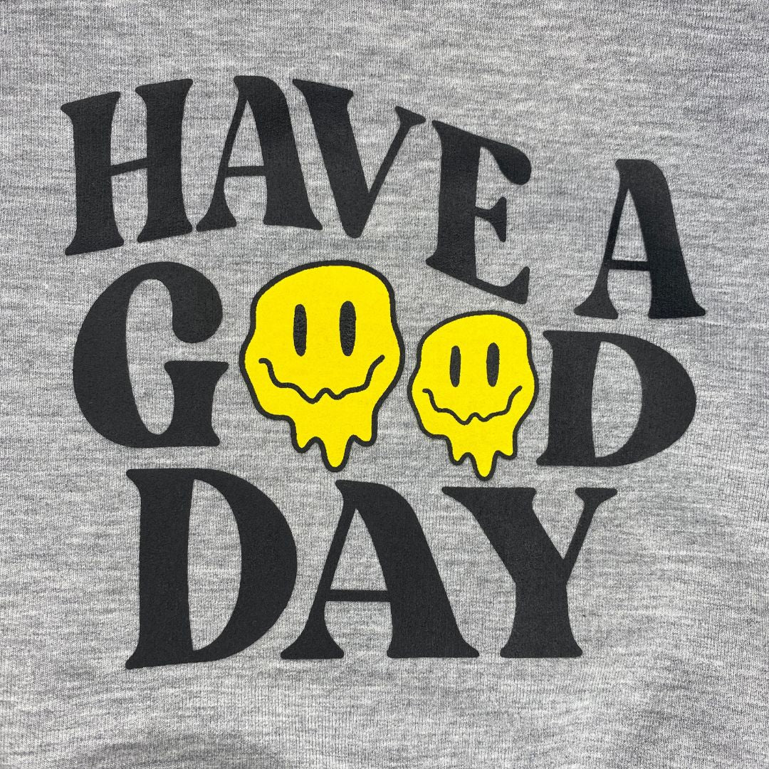 Close up of the back of the "Have a good day" sweatshirt.