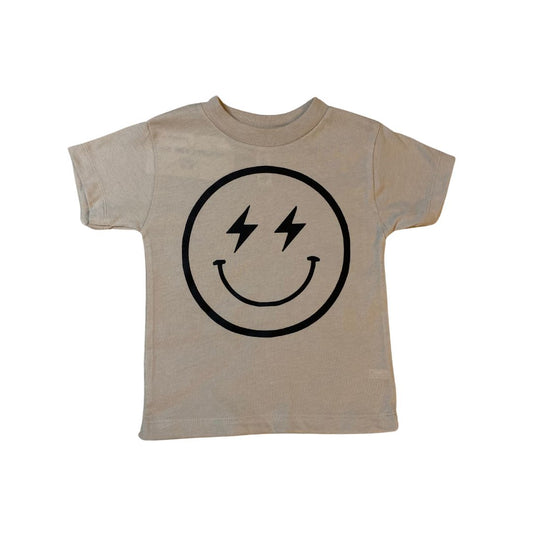 Toddler t-shirt in taupe with a happy face in black with lightening bolt eyes.