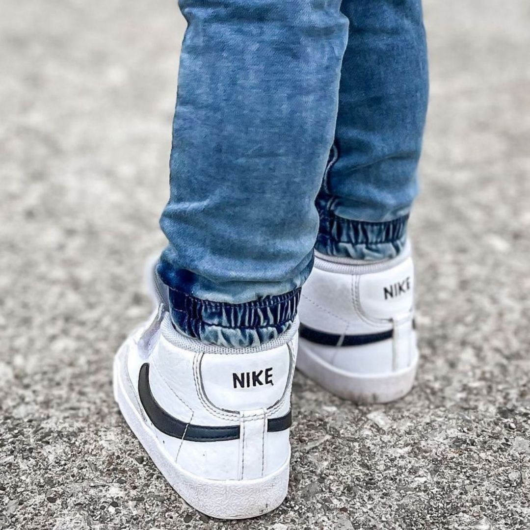 Close up of the elastic ankles on the slim fit denim joggers 