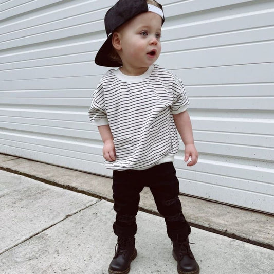 @lil_leo_james in the sweatshirt tee in black and white stripes
